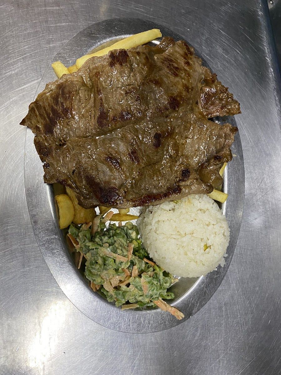 Carne asada con arroz — Asadero Roque