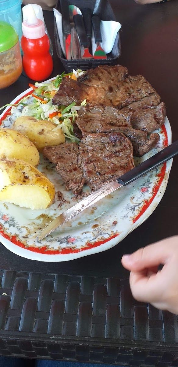 Carne asada con papas — Bajo El Palo E' Mango