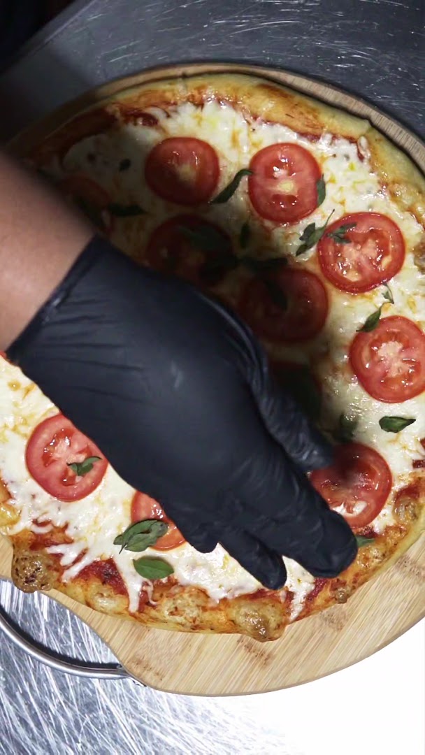 Porción de pizza artesanal