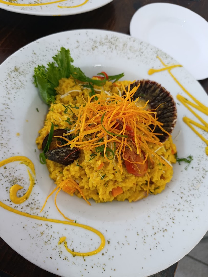 Arroz amarillo con mariscos — Cónchale