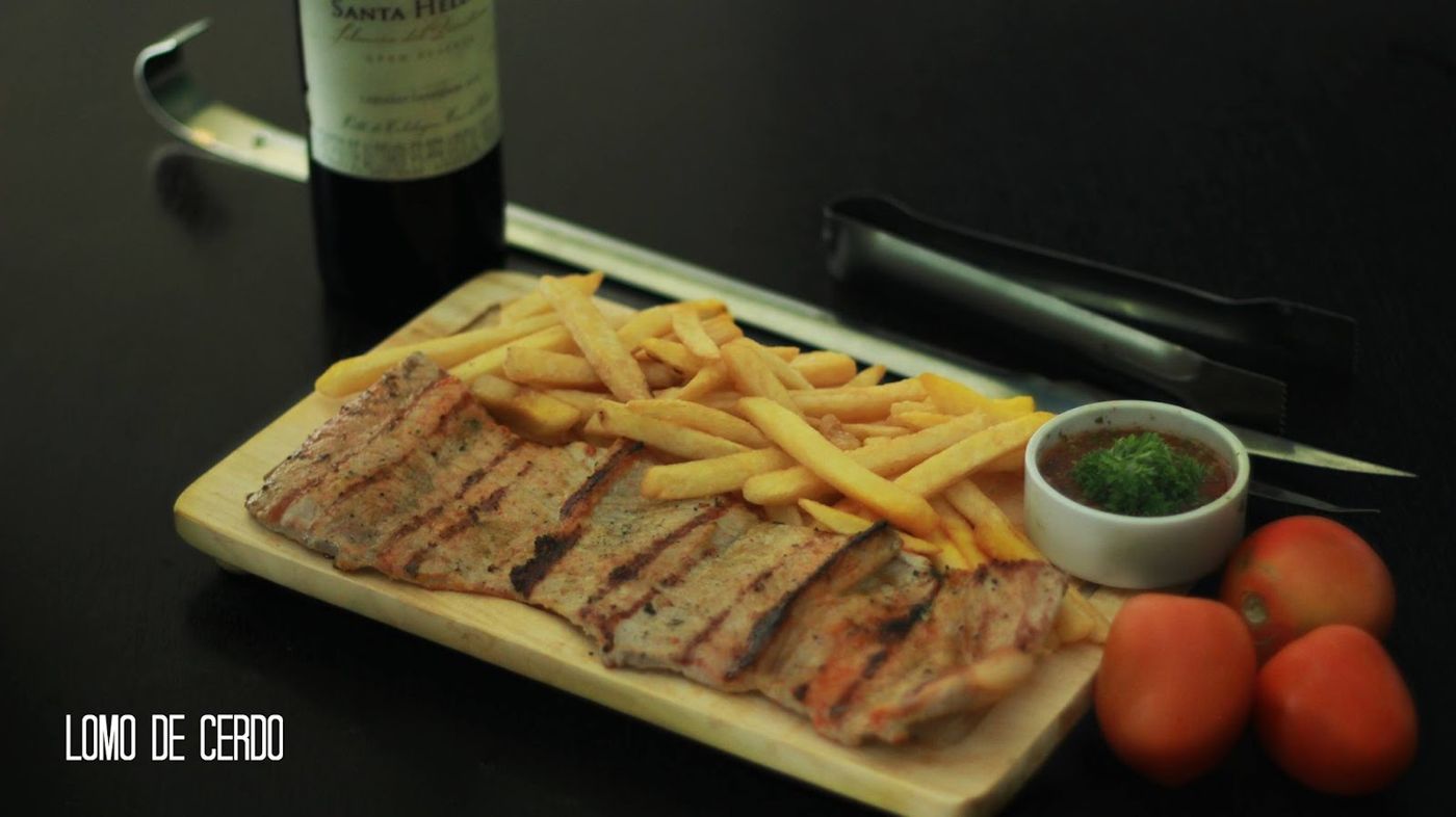 Lomo de cerdo con papas — El Arriero Restaurante Antioqueño