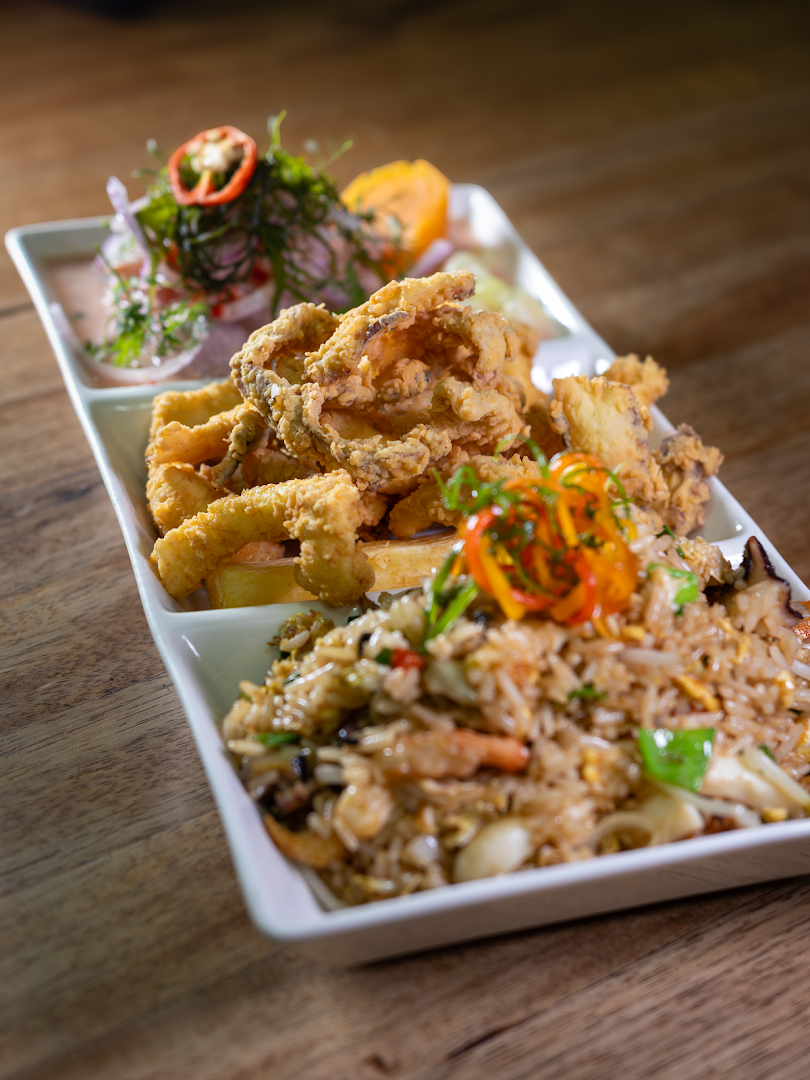 Chicharrón mixto con arroz — kusisqa restaurante