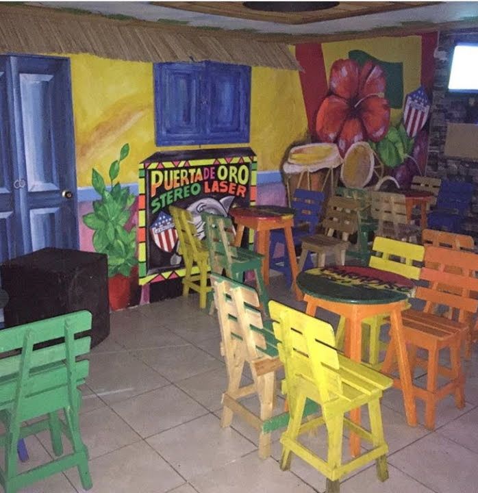 Sillas de colores — La Puerta De Oro Restaurante-Bar