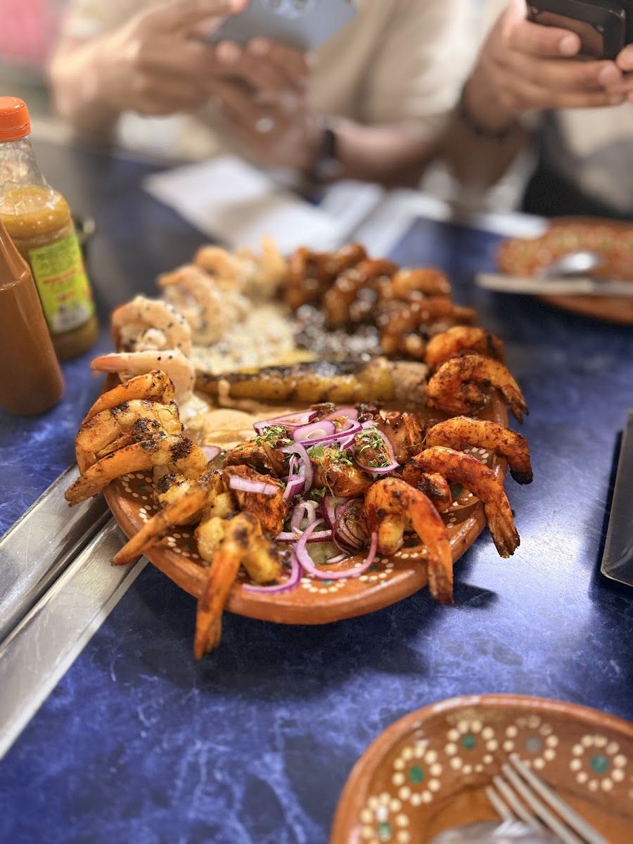 Mariscos Ponte Trucha Negro
