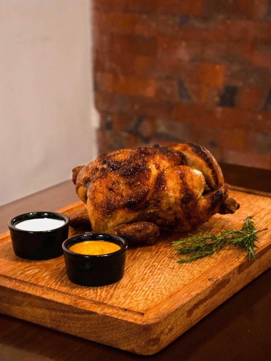 Pollo a la brasa entero — POLLERIA CARBON Y BRASAS