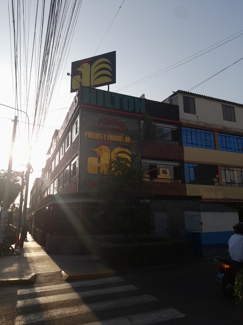Exterior al atardecer — Pollos Hilton