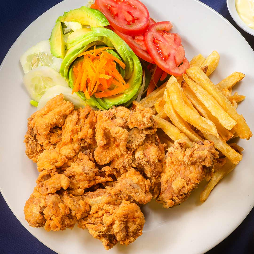 Chicharrón con papas fritas — Restaurante Karibe