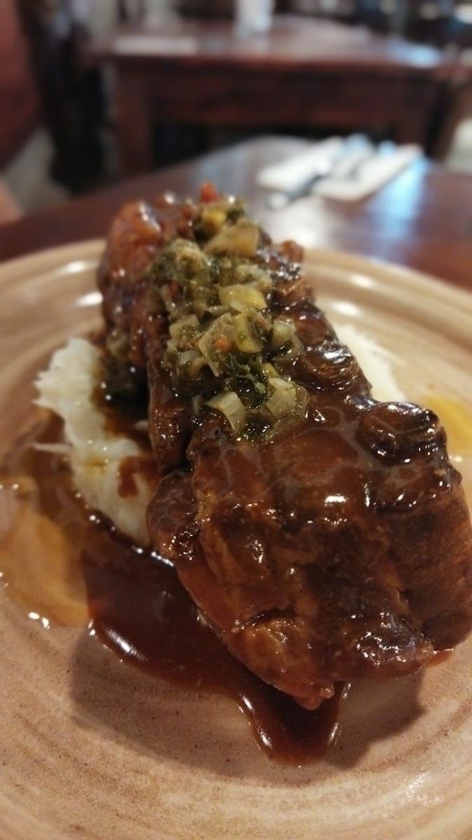 Carne en salsa sobre puré — Restaurante la Potra